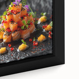 Close-up of black wall art featuring colorful, textured dishes on a framed canvas, ideal for living room decor.