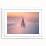 Elegant white-framed landscape artwork displaying a majestic castle surrounded by lush greenery, ideal for enhancing home decor with a touch of classic charm.