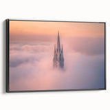 Framed canvas artwork showcasing a stunning landscape featuring a majestic castle, set against a serene backdrop of rolling hills and a clear blue sky. The piece is elegantly presented in a black frame, enhancing its aesthetic appeal for home decor enthusiasts.