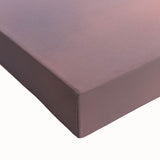 Close-up of a stretched canvas artwork depicting a picturesque landscape featuring a majestic castle surrounded by lush greenery, showcasing vibrant colors and intricate details, ideal for home decor enthusiasts.