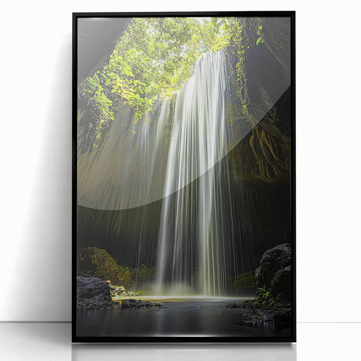 Framed acrylic artwork showcasing a vibrant landscape scene with caves, presented in a sleek black frame, ideal for modern home decor and art enthusiasts.