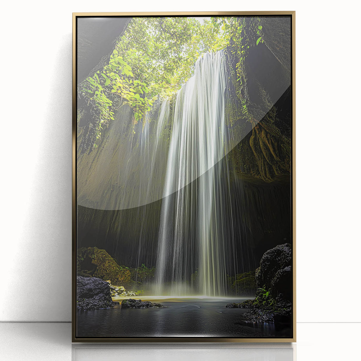 Framed acrylic artwork depicting a stunning landscape with intricate cave formations, featuring a gold accent border, ideal for enhancing modern home decor.