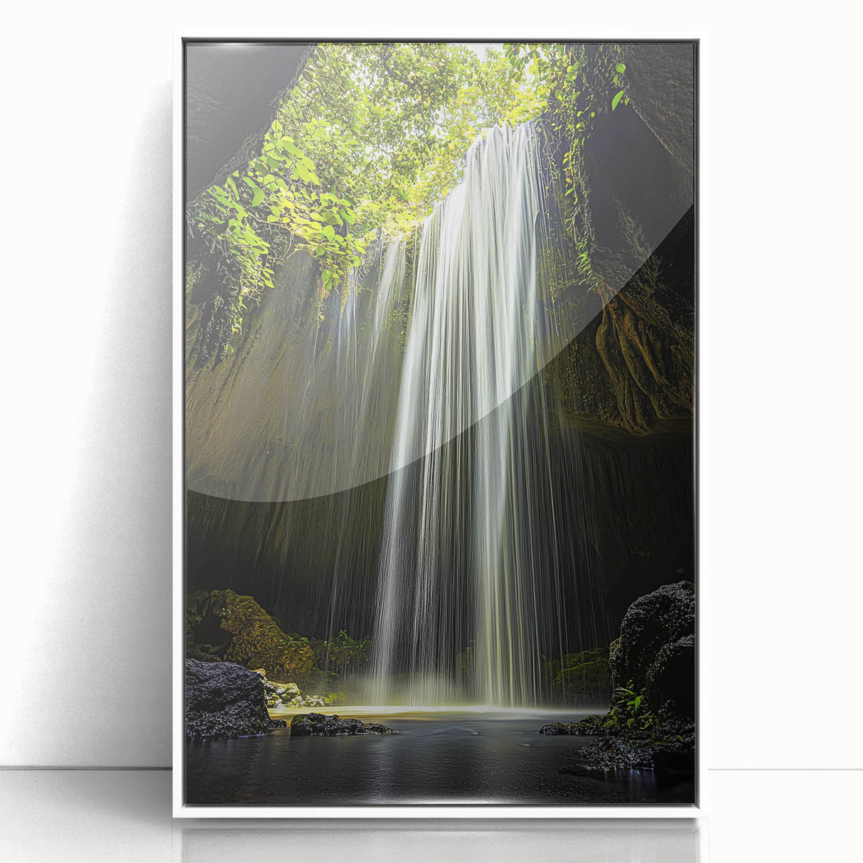 Framed acrylic artwork showcasing a stunning landscape of caves, highlighted by vibrant colors and intricate details, presented in a sleek white frame for modern decor.