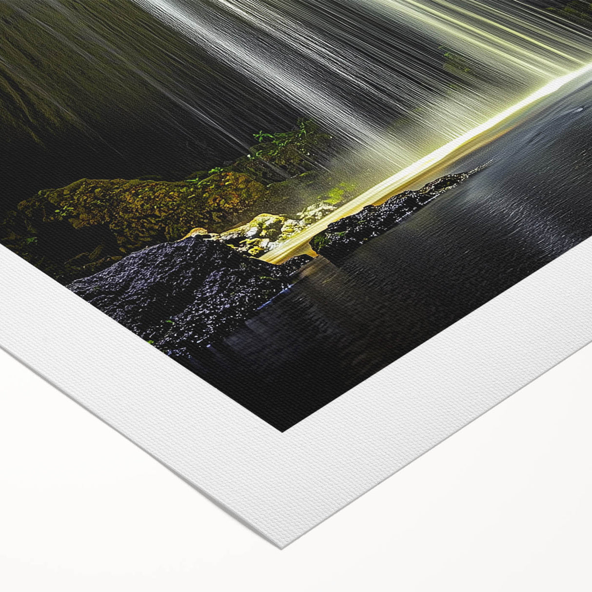 Rolled canvas artwork depicting a vibrant landscape scene with intricate cave formations, showcasing rich colors and textures, ideal for home decor or art enthusiasts.