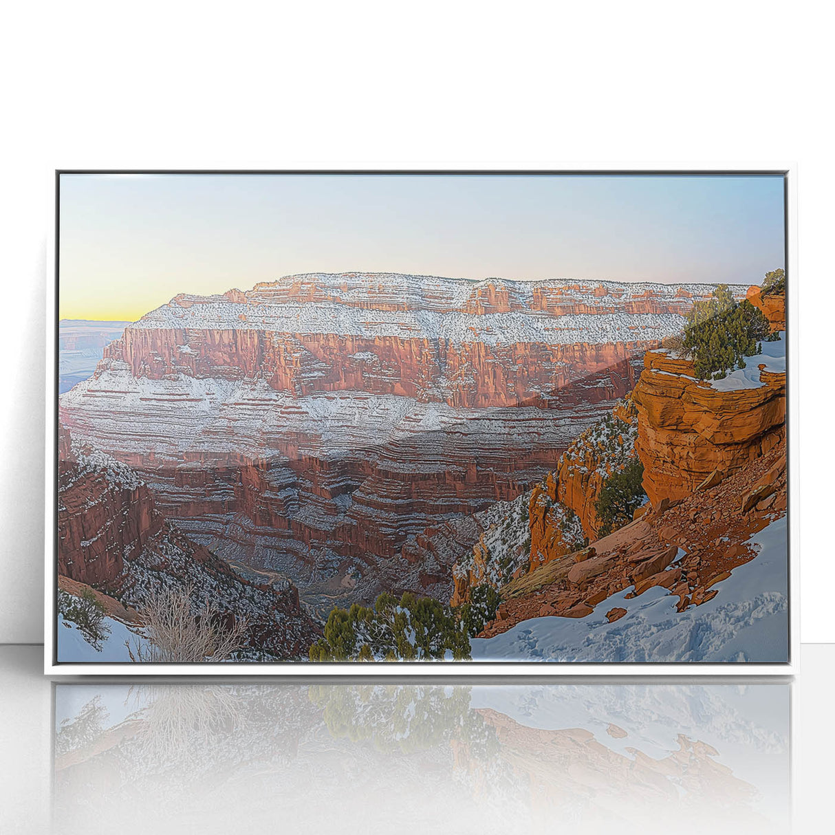 Framed acrylic art piece showcasing a stunning landscape of dramatic cliffs against a serene sky, presented in a sleek white frame, perfect for modern decor.