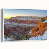 Framed canvas artwork showcasing a stunning cliff landscape in soft hues, displayed from a side view against a minimalist white background, perfect for home decor.