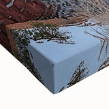 Close-up of a stretched canvas print showcasing vibrant cliff landscapes with rich colors and detailed texture, perfect for enhancing home decor or art collections.