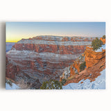 Stretched canvas artwork depicting dramatic cliffs and landscapes in vibrant colors, showcasing natural beauty and depth; perfect for home decor accents.
