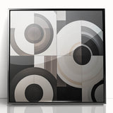 Abstract geometric wall art design featuring bold black shapes and vibrant colors, framed in a sleek black acrylic for a modern aesthetic, perfect for contemporary decor.