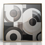 Framed acrylic artwork showcasing an abstract geometric design in gold tones, set against a sleek backdrop. Ideal for modern home decor and artistic spaces.