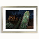 Framed landscape artwork depicting stunning canyons in vibrant colors, featuring a sleek silver mat and frame, ideal for enhancing home decor. Perfect for nature lovers and art enthusiasts.
