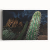 Vibrant landscape canvas artwork depicting stunning canyons in rich hues of orange and blue, showcasing dramatic rock formations and expansive skies, perfect for home decor.