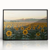 Framed acrylic artwork depicting a serene countryside landscape with vibrant colors, featuring rolling hills and a clear blue sky, presented in a sleek black frame.