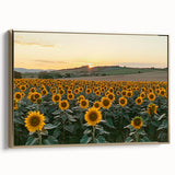 Framed canvas artwork showcasing a serene countryside landscape, featuring lush green fields and a clear blue sky, with an elegant gold frame complementing the design.