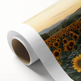 Rolled canvas artwork depicting a serene countryside landscape, showcasing vibrant greens and soft blues, elegantly packaged in a protective cardboard tube, ideal for home decor.