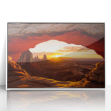 Framed acrylic artwork showcasing a vibrant desert landscape with warm orange and yellow hues, set in a sleek white frame, perfect for modern decor.