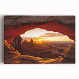 Stretched canvas artwork depicting a vibrant desert landscape with rich orange and yellow hues, showcasing a dramatic sunset over sand dunes, perfect for home decor.