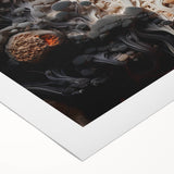 Art deco poster featuring geometric patterns in black and gold on a rolled canvas.