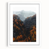 Abstract art print of autumn leaves in orange and red tones on a framed white canvas, suitable for dining room decor.