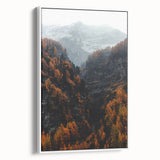 Vintage poster art of autumnal scene in a white framed canvas, featuring colorful foliage on a black background.