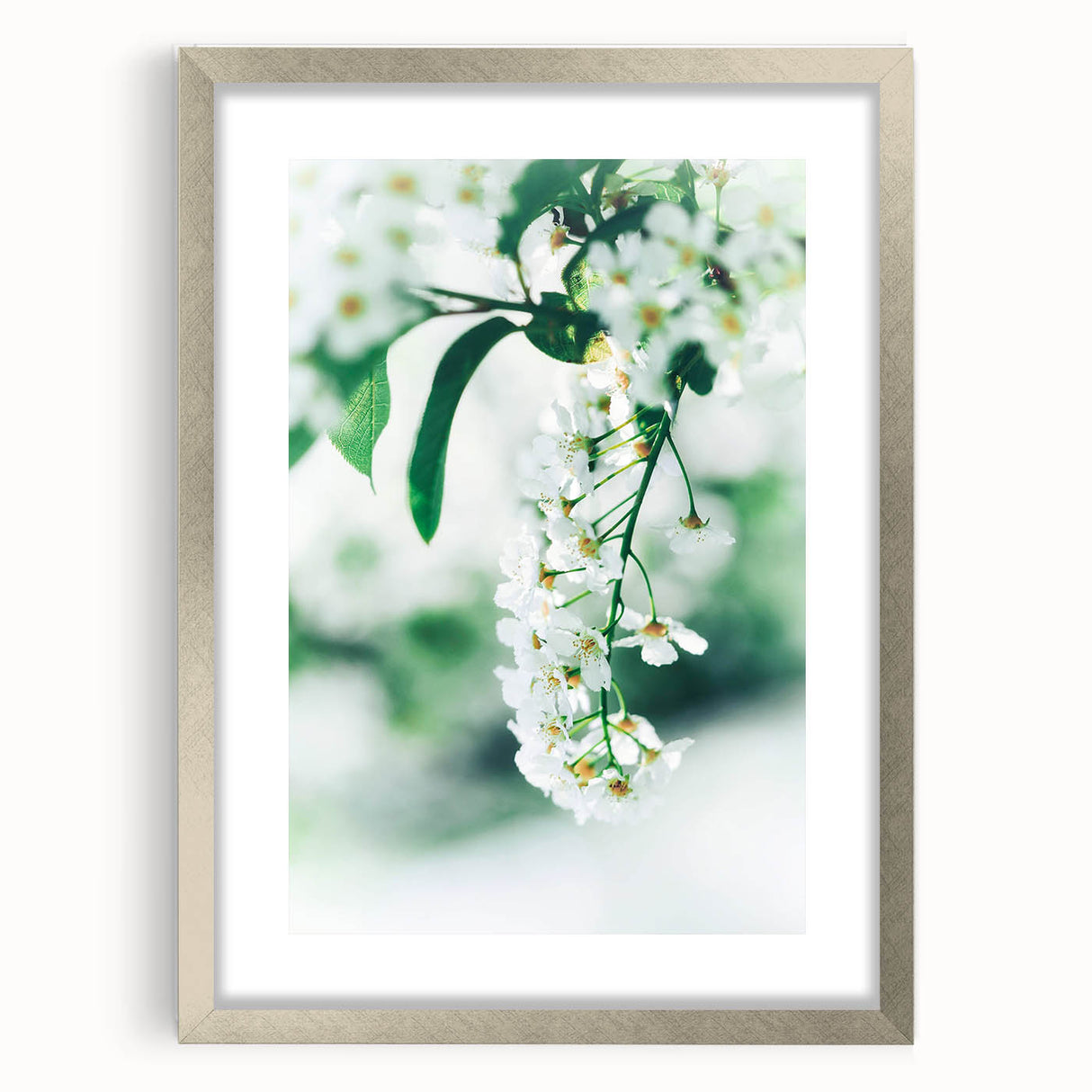 Textured abstract art print in soft pastel colors, framed in silver, ideal for bedroom wall decor.