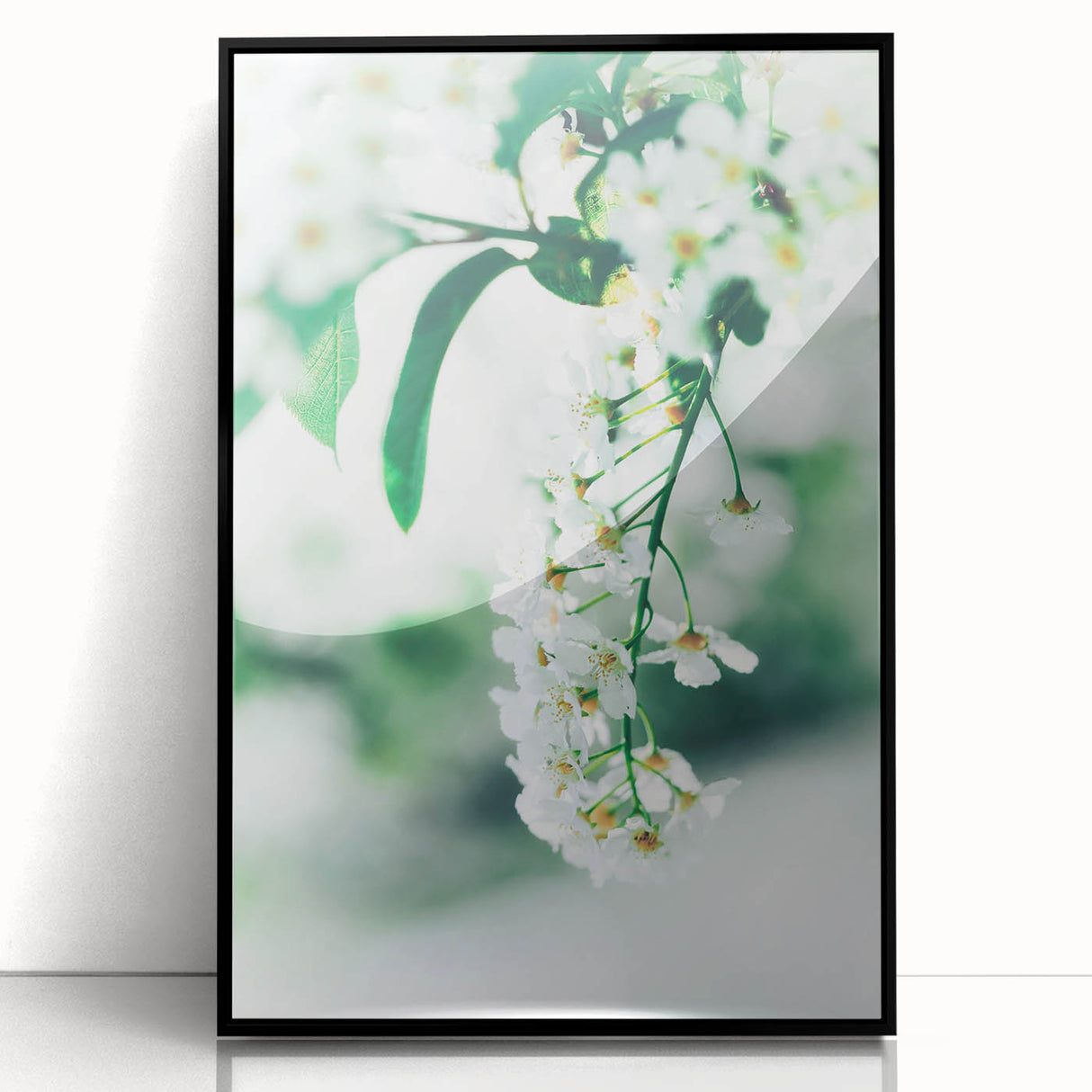 Large abstract wall art of spring season in green and yellow tones on a framed acrylic.