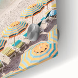 Large abstract wall art in vibrant orange and yellow tones on acrylic glass.