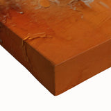 Close-up of abstract strokes wall art on stretched canvas, showcasing vibrant hues of blue, orange, and yellow, perfect for modern home decor or art enthusiasts.