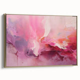 Framed canvas wall art showcasing abstract strokes in gold and black, set against a sleek white background, perfect for modern home decor.