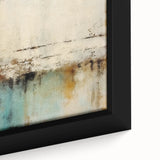 Close-up of framed canvas wall art showcasing abstract strokes in vibrant blue and gold hues, perfect for modern home decor, adding a stylish touch to any room.