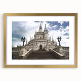 Elegant gold-framed landscape artwork showcasing a majestic castle surrounded by lush greenery, complete with a white mat for an upscale presentation. Ideal for home decor enthusiasts seeking to enhance their space with classic charm.