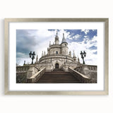 Elegant silver-framed landscape artwork depicting a majestic castle surrounded by lush greenery and mountains, ideal for enhancing home decor and aesthetics.