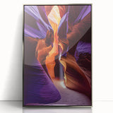 Framed acrylic artwork showcasing a stunning landscape of caves, featuring a silver frame and vibrant colors, perfect for home decor or office settings.