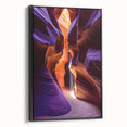 Framed canvas art showcasing a stunning landscape of caves, featuring rich colors and intricate details, presented in a sleek black frame, ideal for modern decor.