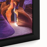 Close-up of a framed canvas showcasing a vibrant landscape scene with intricate cave formations, perfect for home decor or art enthusiasts. The rich colors and detailed textures enhance any space, making it an ideal statement piece.