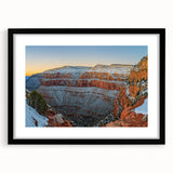 Black-framed landscape print showcasing dramatic cliffs and serene waters, designed with a white mat for an elegant presentation, perfect for home decor.