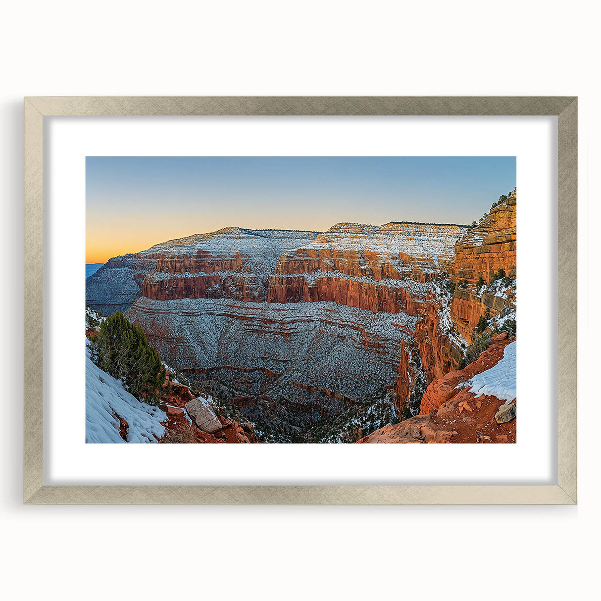 Framed landscape artwork showcasing dramatic cliffs in silver finish, featuring a white mat for enhanced presentation, perfect for modern home decor.