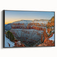 Framed canvas artwork depicting dramatic cliffs and landscapes, showcasing vibrant colors and intricate details, set against a sleek black frame, ideal for modern home decor.