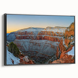 Framed canvas artwork depicting dramatic cliffs and landscapes, showcasing vibrant colors and intricate details, set against a sleek black frame, ideal for modern home decor.