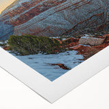 Stunning rolled canvas artwork depicting a dramatic landscape of cliffs under a vibrant sunset, showcasing rich colors and textures, ideal for home decor.