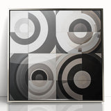 Abstract geometric framed acrylic art piece with a silver finish, showcasing a modern design ideal for contemporary home decor, set against a neutral background.