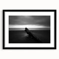 Framed landscape artwork of serene beaches, featuring a black mat and sleek black frame, perfect for enhancing home decor or office spaces. Ideal for beach lovers seeking a calming aesthetic.