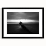 Framed landscape artwork of serene beaches, featuring a black mat and sleek black frame, perfect for enhancing home decor or office spaces. Ideal for beach lovers seeking a calming aesthetic.