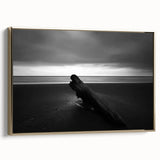 Framed canvas artwork depicting a serene beach landscape with soft golden hues and gentle waves, showcasing a stylish side view design perfect for home decor.