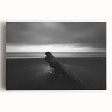 Stretched canvas artwork depicting a serene beach landscape at sunset, showcasing vibrant hues of orange and blue, perfect for coastal home decor enthusiasts.