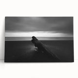 Stretched canvas artwork showcasing a vibrant beach landscape with clear blue skies, gentle waves, and golden sands, perfect for coastal home décor.