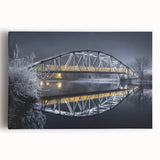 Landscape canvas artwork depicting a serene bridge over a tranquil river, showcasing vibrant colors and intricate details, perfect for home decor. The artwork's lush greenery and calm water evoke a sense of peace and connection to nature, ideal for enhancing any living space.