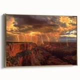 Framed canvas artwork depicting a vibrant landscape of canyons with rich gold accents, ideal for enhancing home decor and adding a touch of elegance to any room.