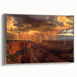 Framed canvas artwork depicting a stunning landscape of canyons, showcased in a sleek silver frame, perfect for enhancing modern home decor with natural beauty.