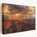 Stretched canvas artwork depicting a stunning landscape of canyons at sunset, showcasing vibrant orange and purple hues, perfect for home decor enthusiasts.